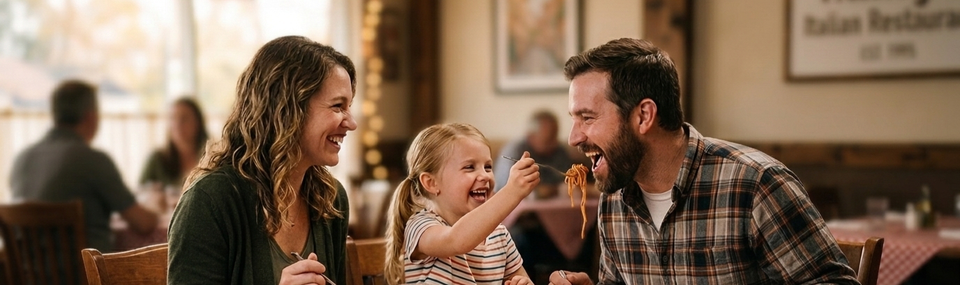 Family enjoying Italian food in Cypress, TX restaurant